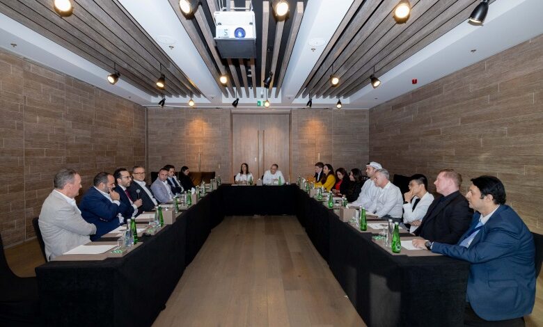 Participants discussing at Unlock roundtable.