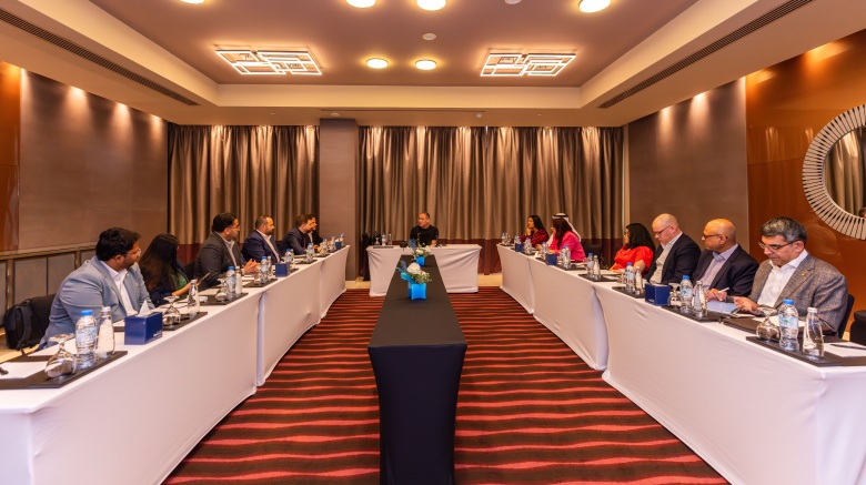 Closed-door roundtable discussing UAE stablecoins and tokenization during Abu Dhabi Finance Week